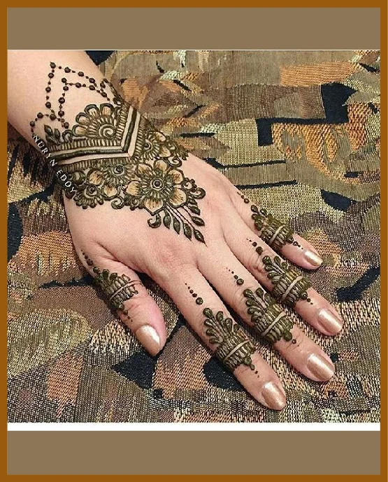 Curvy Floral Wrist Modern Back Hand Mehndi Design